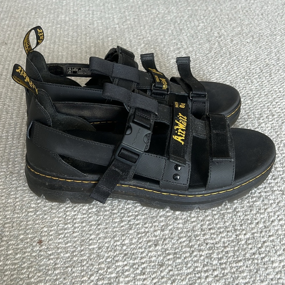 Dr. Martens sandals in black.
